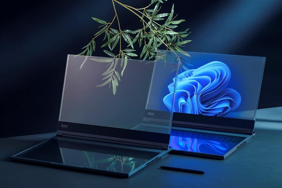 A computer with a blue flower on it
Description automatically generated